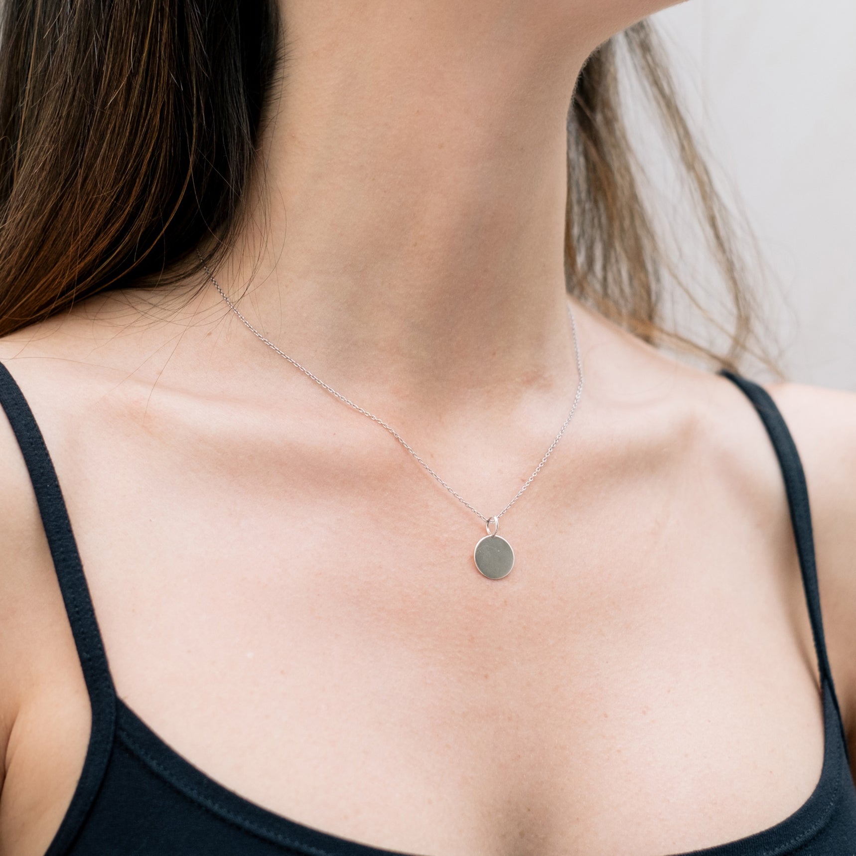 Necklace with circular pendant